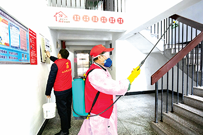 為加強疫情防控 杭州富陽區(qū)委組織部組織機關干部進社區(qū)